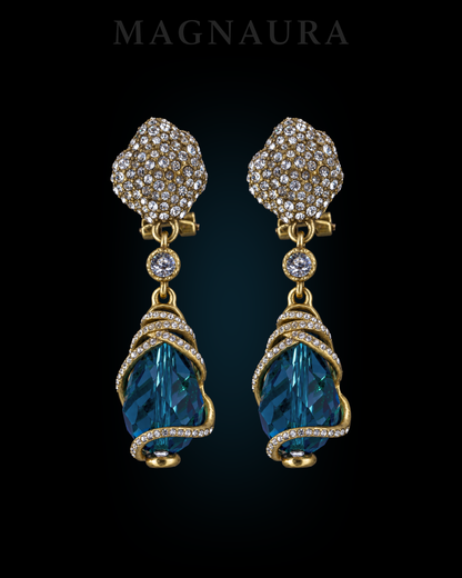 Pair of The Lagoon Spiral Drops with peacock-blue faceted drops and gold-tone spiral detailing.