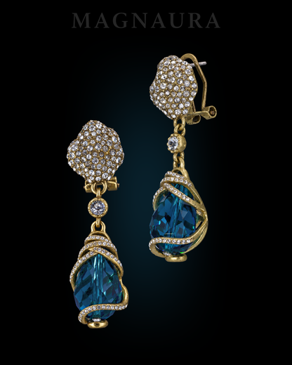 The Lagoon Spiral Drops arranged at staggered angles to show the blue drops and gold-tone spiral profiles.