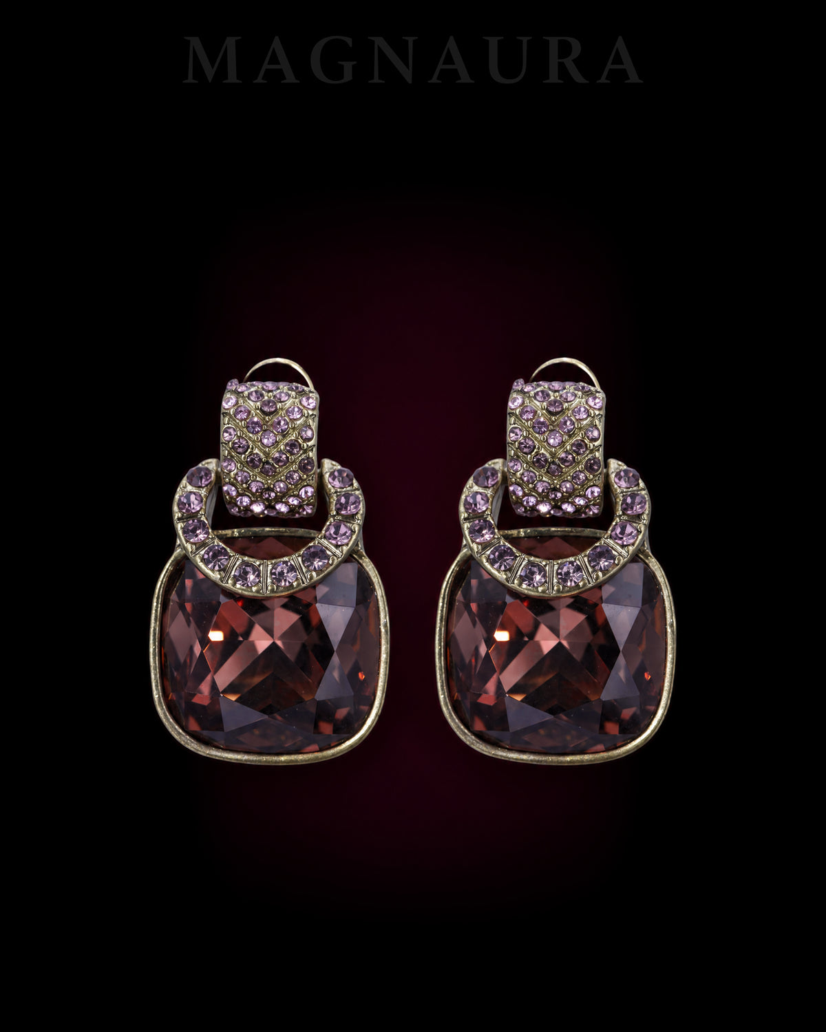 MAGNAURA The Cognac Crescent Studs, a matching pair with wine-brown cushion-shaped glass and purple accents.